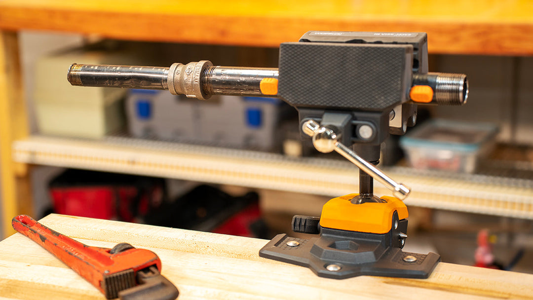 IQ Vise with a Metal Pipe firmly secured within the Pipe-Fit Jaws